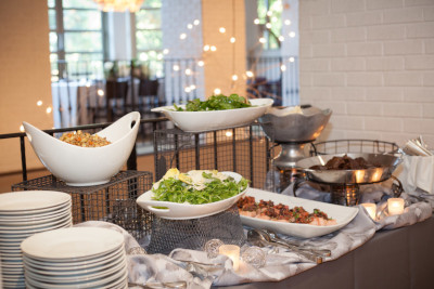 Catering table with meat and salads